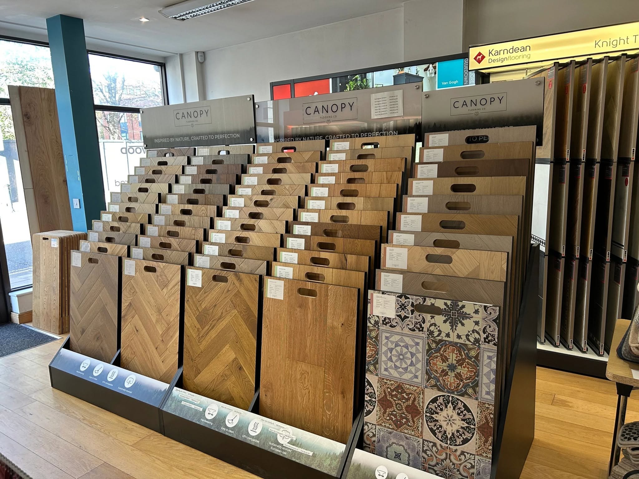 Wood flooring and patterned floor samples on display in the Bedford showroom